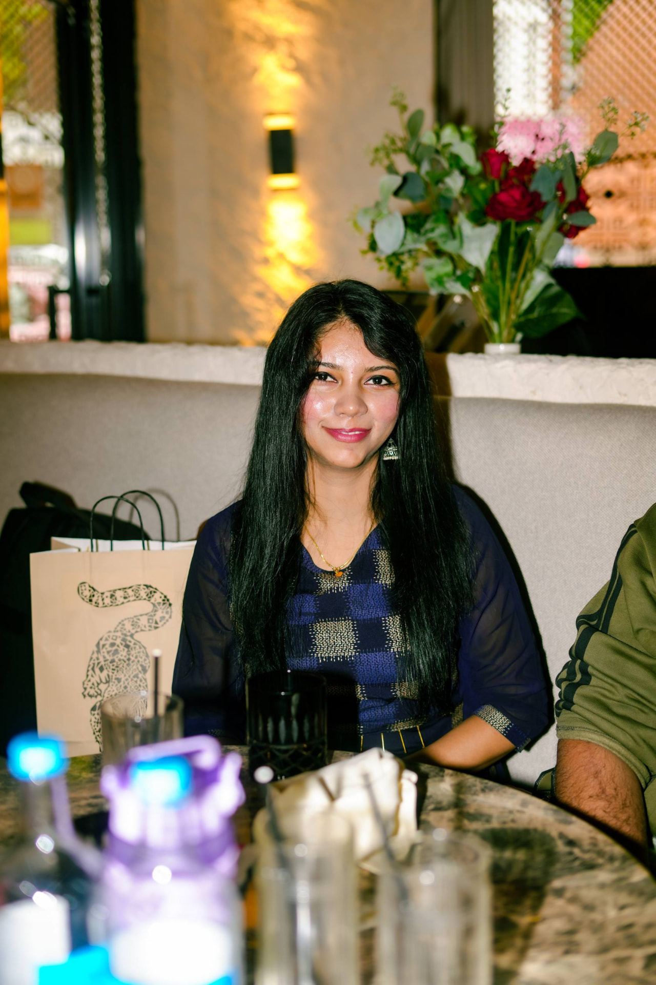 A member at dinner during a community experience