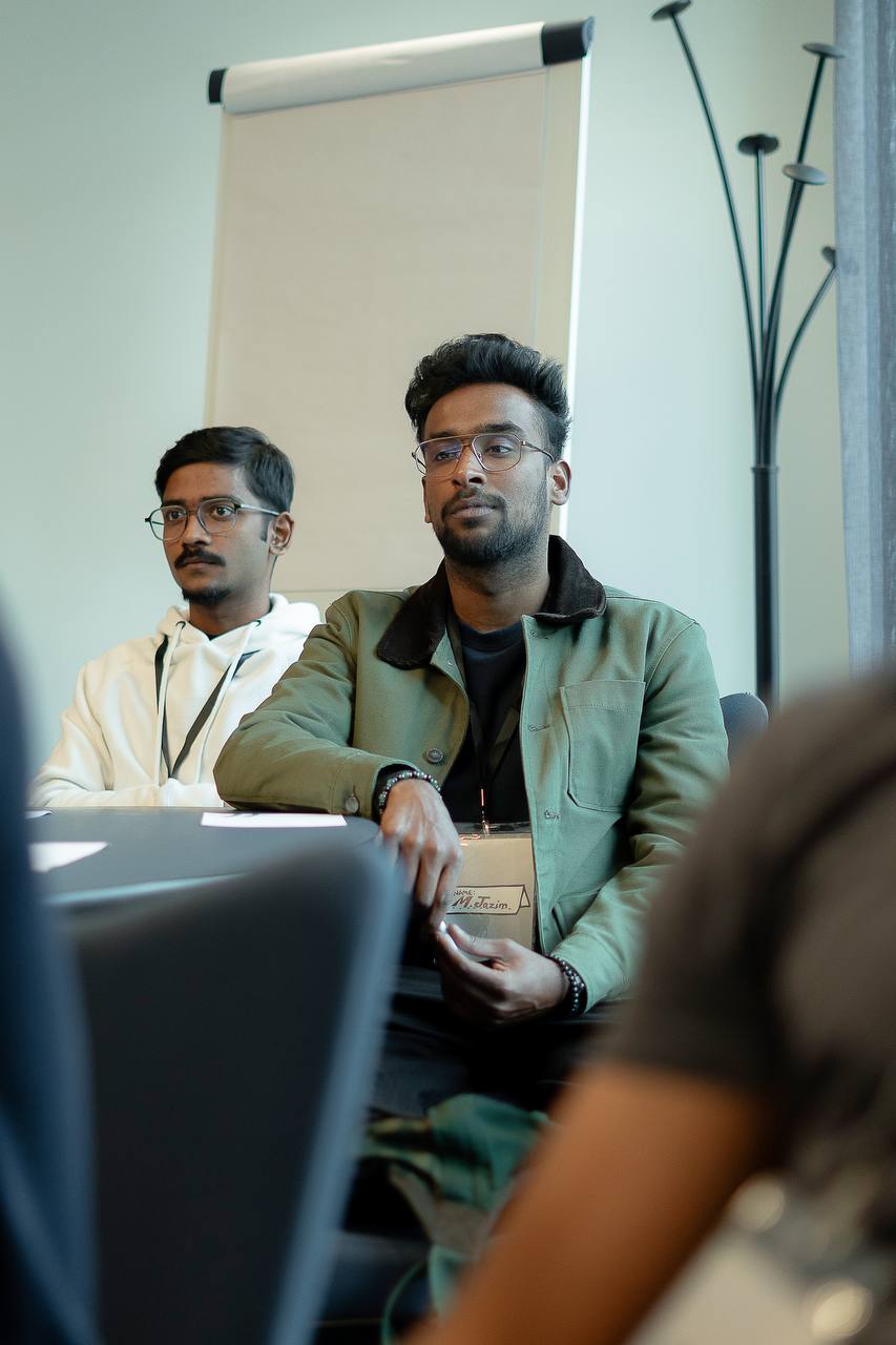 Two members listening during a meetup session