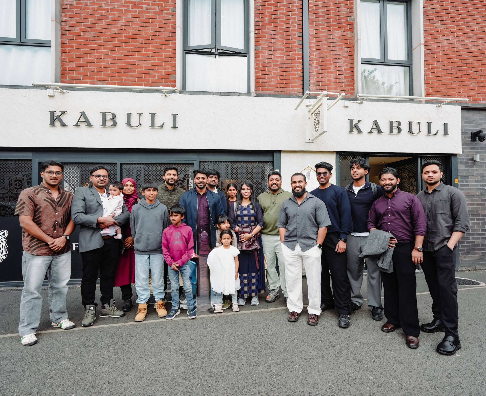 The community outside a restaurant after a meetup