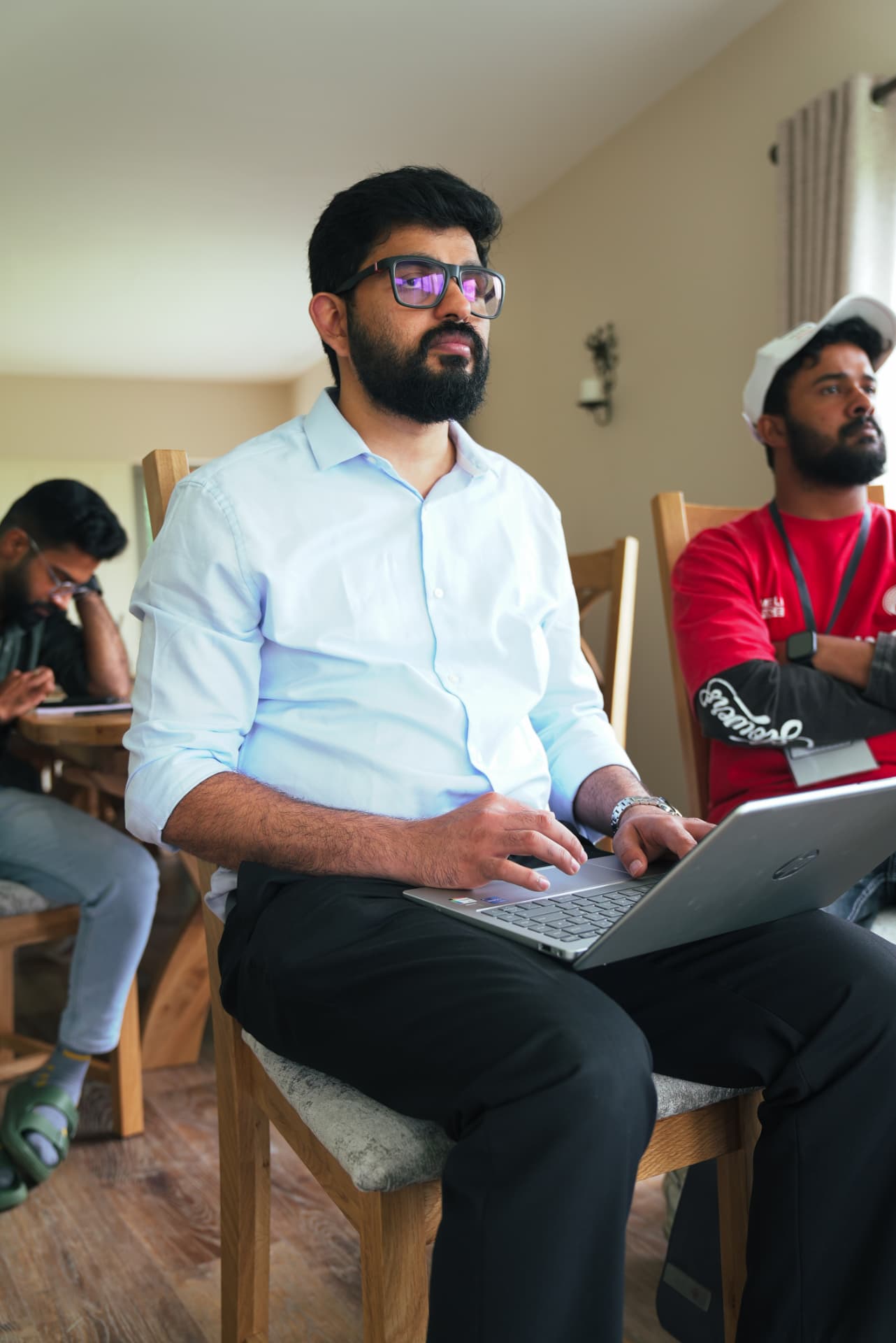A member working from his laptop during a meetup session