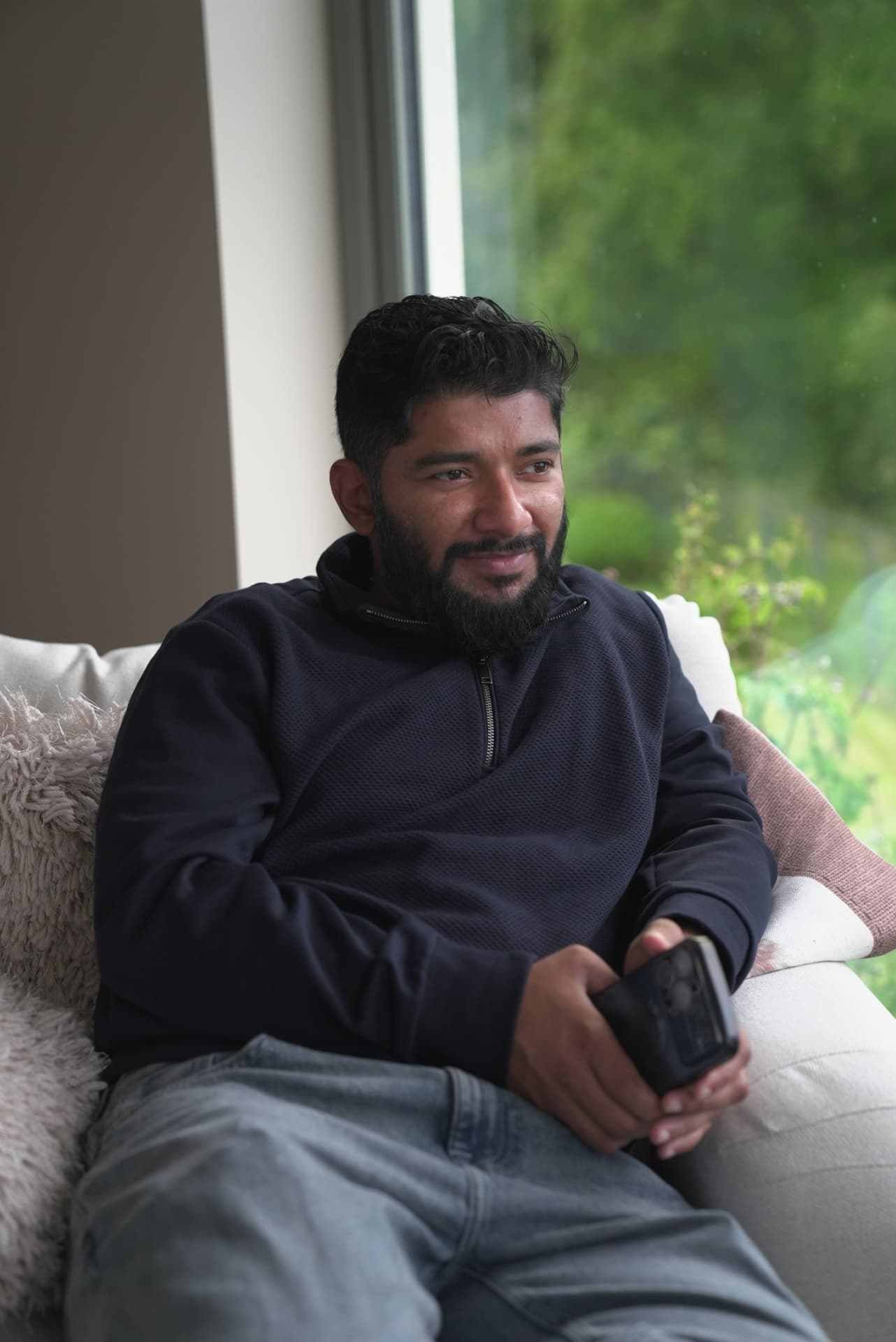 A member relaxing between sessions at a monthly meetup