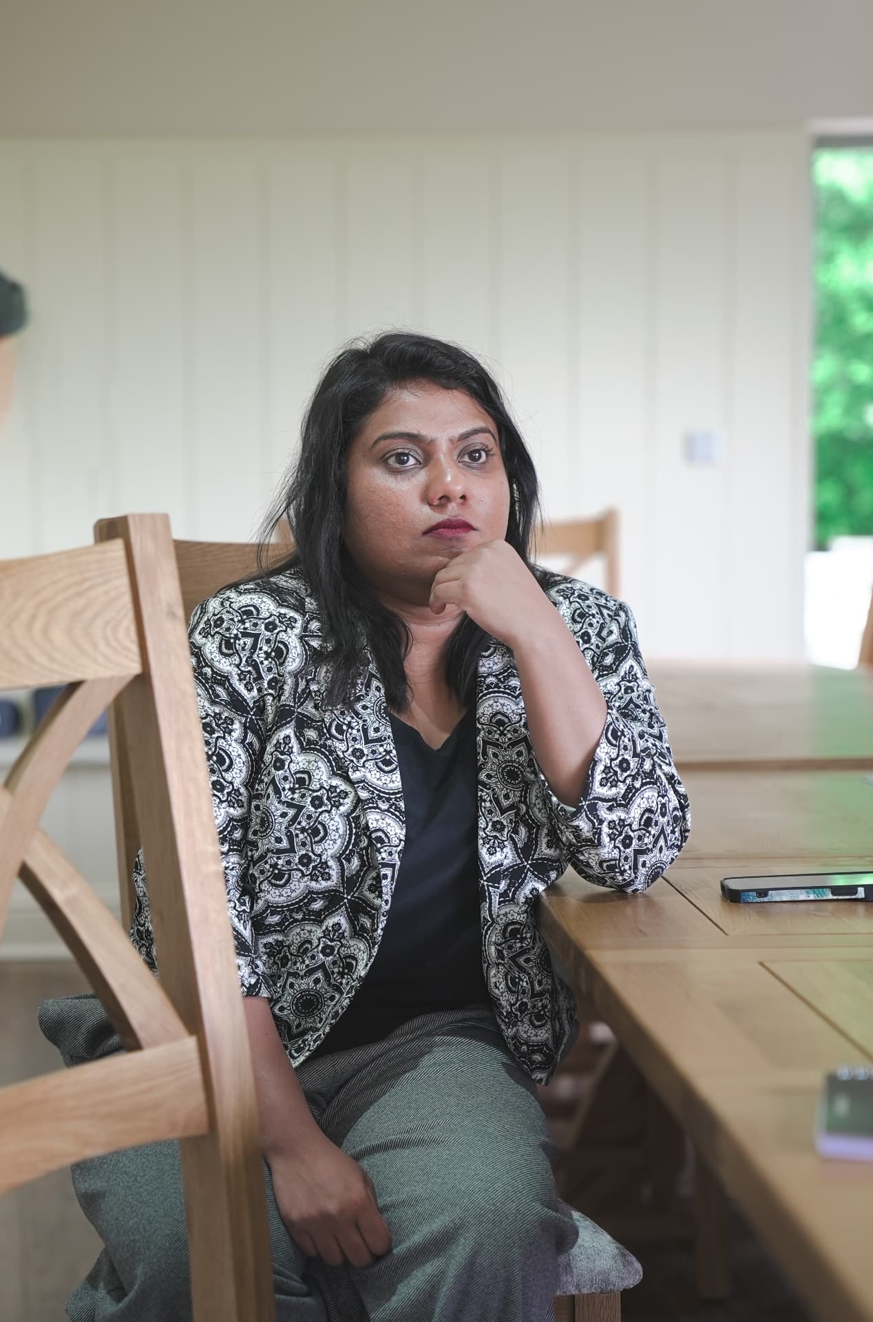 A member listening thoughtfully during a group discussion