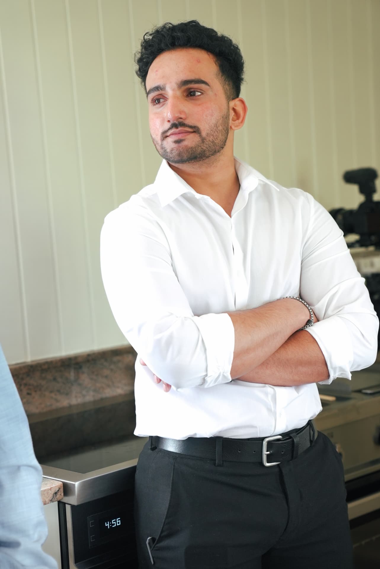 A member standing during an experience gathering
