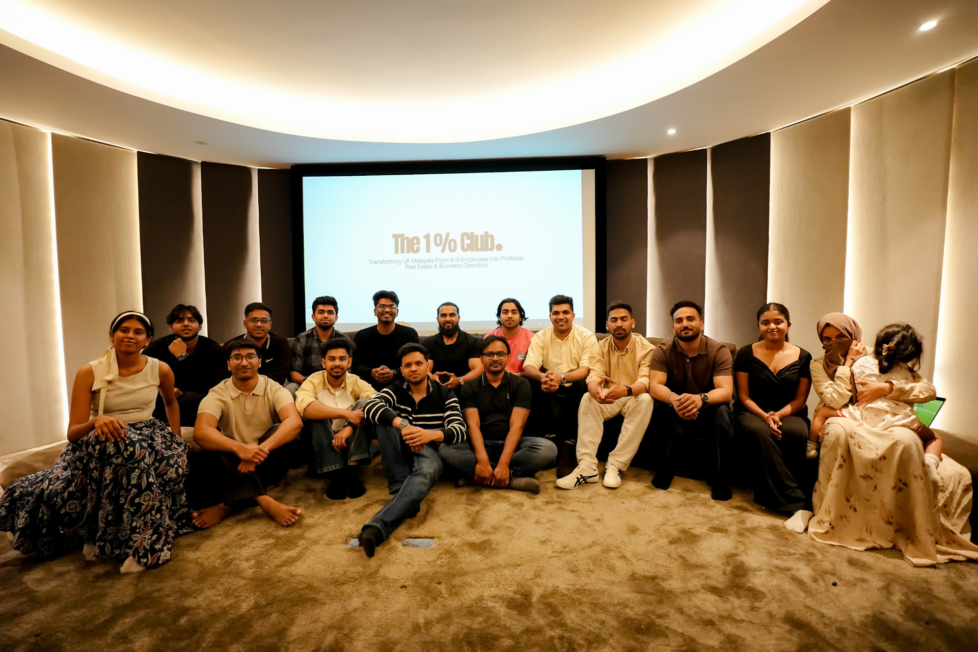 Members of The 1% Club at an in-person event