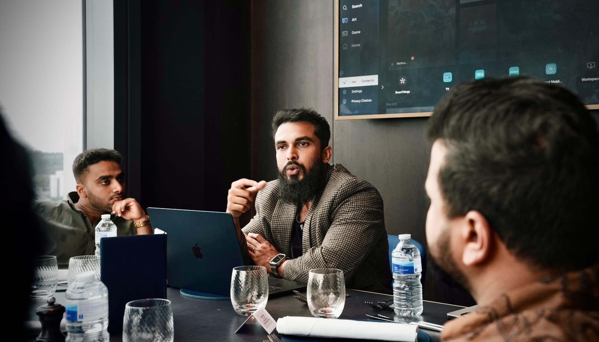 A member leading a discussion at a monthly mastermind